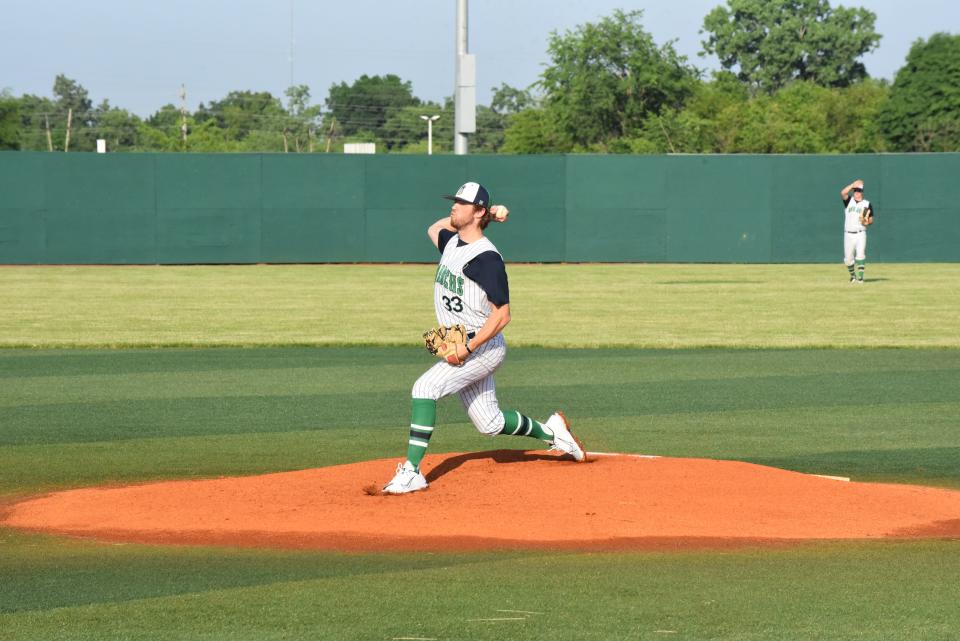 Monarchs' Kevin Korte delivers a pitch during a game against Jet Box at Siena Heights.