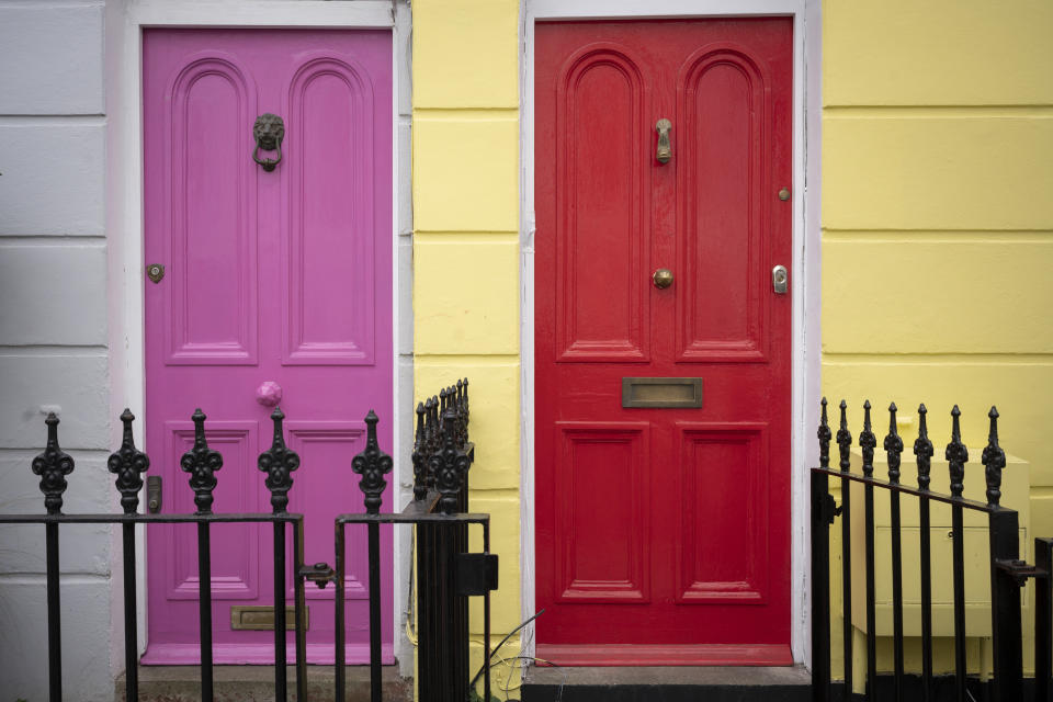 Two doorways painted pink and red represent next-door-neighbours in period properties in Kelly Street NWI, in the north London borough of Camden, on 6th March 2023, in London, England. (Photo by Richard Baker / In pictures via Getty Images)