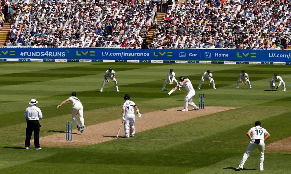 <span>Zak Crawley hits Pat Cummins for four off the first ball of the 2023 Ashes series at Edgbaston.</span><span>Photograph: Ryan Pierse/Getty Images</span>