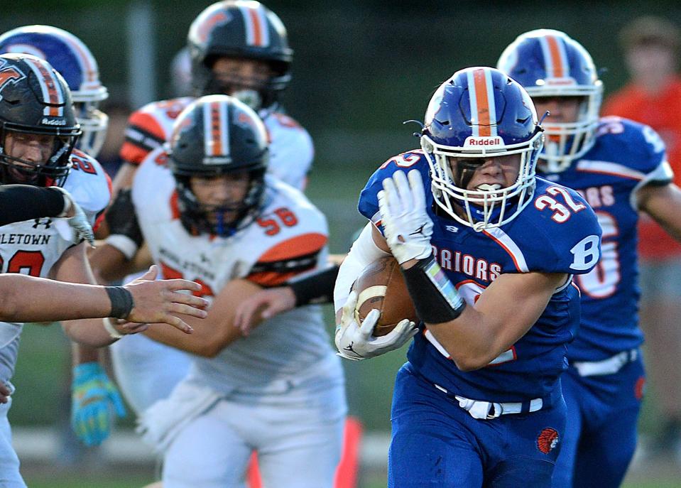 Boonsboro's Wyatt Jervis carries the ball for the Warriors against Middletown on Sept. 23, 2022.