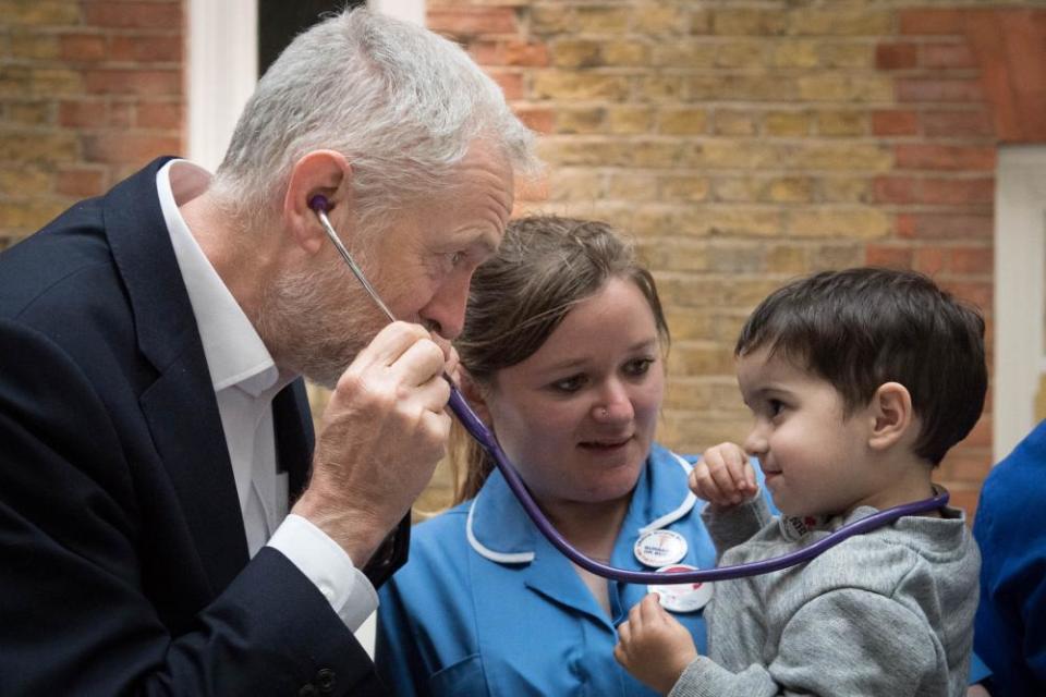 Labour leader Jeremy Corbyn pretends to use a stethoscope with 2-year-old Haroon, after he met NHS nurses, student nurses and midwives to discuss Labour’s three point election guarantee for NHS staff at the headquarters of UNISON in north London. PRESS ASSOCIATION Photo. Picture date: Wednesday April 26, 2017. See PA story ELECTION Main. Photo credit should read: Stefan Rousseau/PA Wire