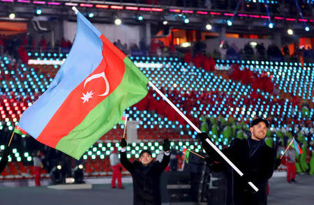 FILE PHOTO - Feb 9, 2018; Pyeongchang, South Korea; Patrick Brachner of Azerbaijan carries the national flag with delegates during the Pyeongchang 2018 Olympic Winter Games Opening Ceremony at Pyeongchang Olympic Stadium. Mandatory Credit: Rob Schumacher-USA TODAY Sports/File Photo