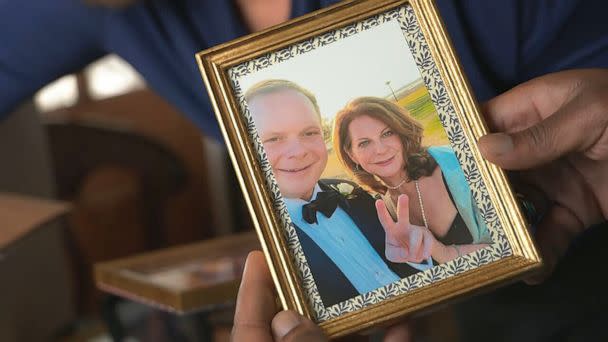 PHOTO: A framed photo shows Linda Clary and her late son, John Umberger. (ABC News)