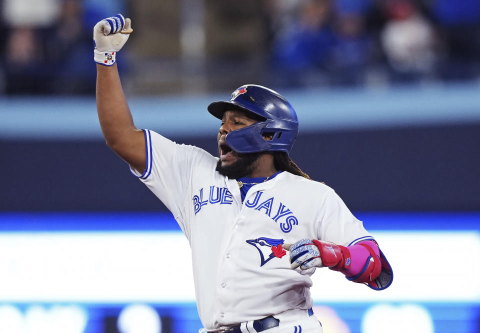 Toronto Blue Jays' Vladimir Guerrero Jr. celebrates his two-run double against the Kansas City Royals during the seventh inning of a baseball game Friday, Sept. 8, 2023, in Toronto. (Nathan Denette/The Canadian Press via AP)