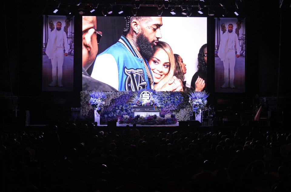 Photos are displayed during Nipsey Hussle's "Celebration of Life" on April 11, 2019, at Staples Center in Los Angeles. Nipsey Hussle was fatally shot in front of his store on March 31, 2019, in Los Angeles. (Photo: Kevork Djansezian via Getty Images For All Money In Records and Atlantic Records)