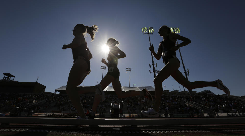 Runners compete in the women's 1,500 meters during the NCAA outdoor track and field championships in Austin, Texas, Saturday, June 8, 2019. (AP Photo/Eric Gay)