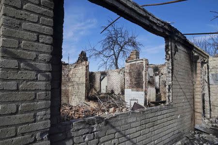 A house which was damaged by fighting is seen in the town of Debaltseve February 25, 2015. REUTERS/Baz Ratner