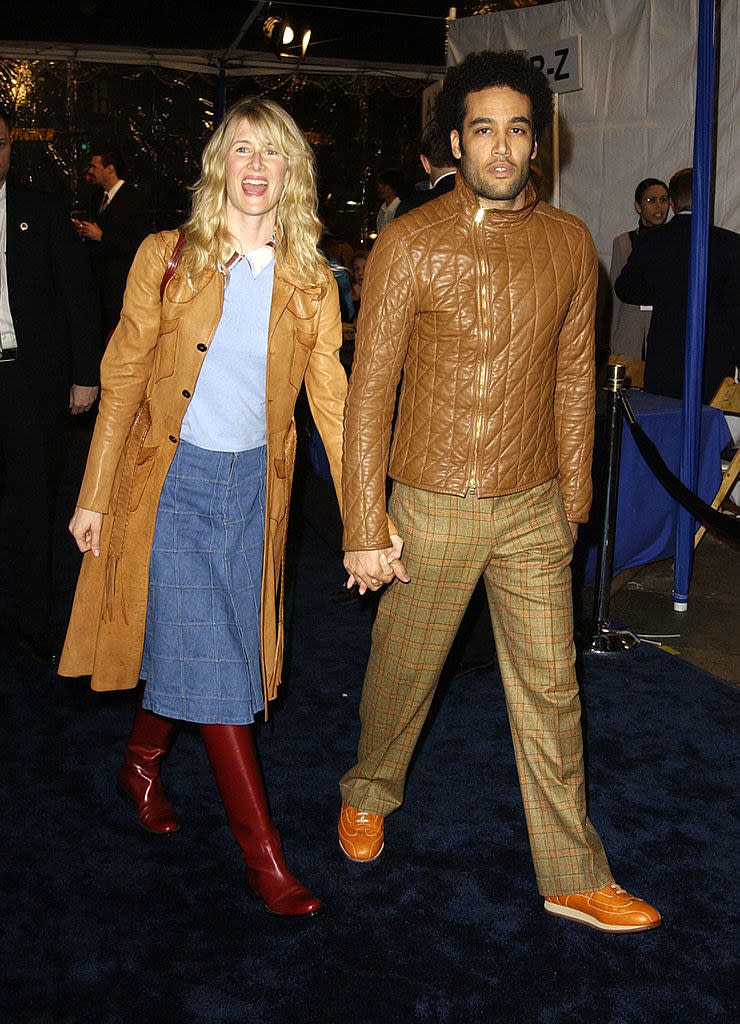 Laura Dern and Ben Harper on a red carpet holding hands