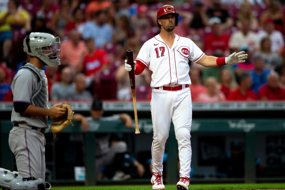 Cincinnati Reds shortstop Kyle Farmer (17) reacts to a called swing by the first base umpire in the third inning of the MLB baseball game between the Cincinnati Reds and the Miami Marlins at Great American Ball Park in Cincinnati on Monday, July 25, 2022.