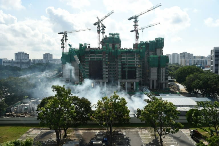 Fumigation work is underway at a construction site near the Aljunied housing estate in Singapore on August 31, 2016