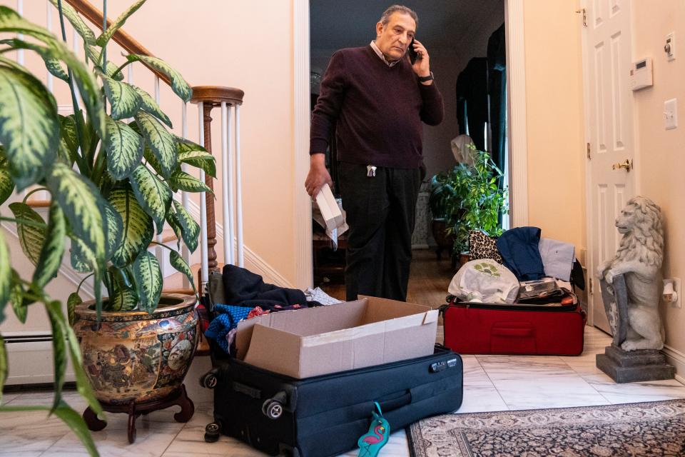 Dr. Souheil Saba, retired doctor and cofounder of the Al-Hawash Private University Hospital prepares for a trip to Syria to help with earthquake relief. Saba is bringing suitcases filled with medical supplies and clothing for the earthquake victims. Saba is shown in his Wayne, NJ home on Thursday, Feb. 9, 2023.