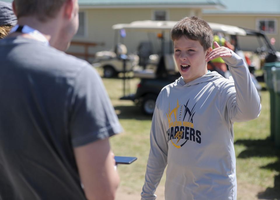 Young Eagles member Jack Magnin talks about his flight experiences during an interview during Day 4 of EAA AirVenture on Thursday, July 28, 2022, at Wittman Regional Airport in Oshkosh, Wis.