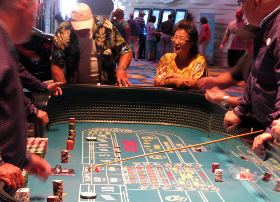 This June 20, 2019 photo shows a game of craps underway at the Ocean Casino Resort in Atlantic City, N.J. The Ocean and Hard Rock casinos both reopened on June 27, 2018, and are fighting for business in the expanded Atlantic City gambling market. (AP Photo/Wayne Parry)