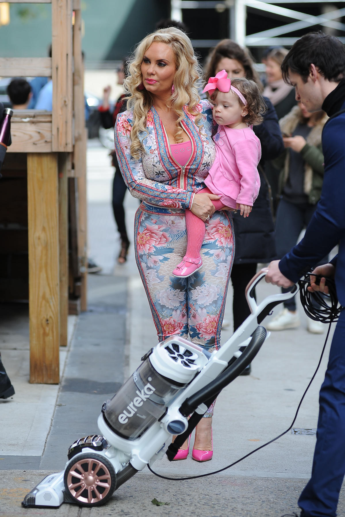 Coco Austin hired a guy to vacuum the street where she walked