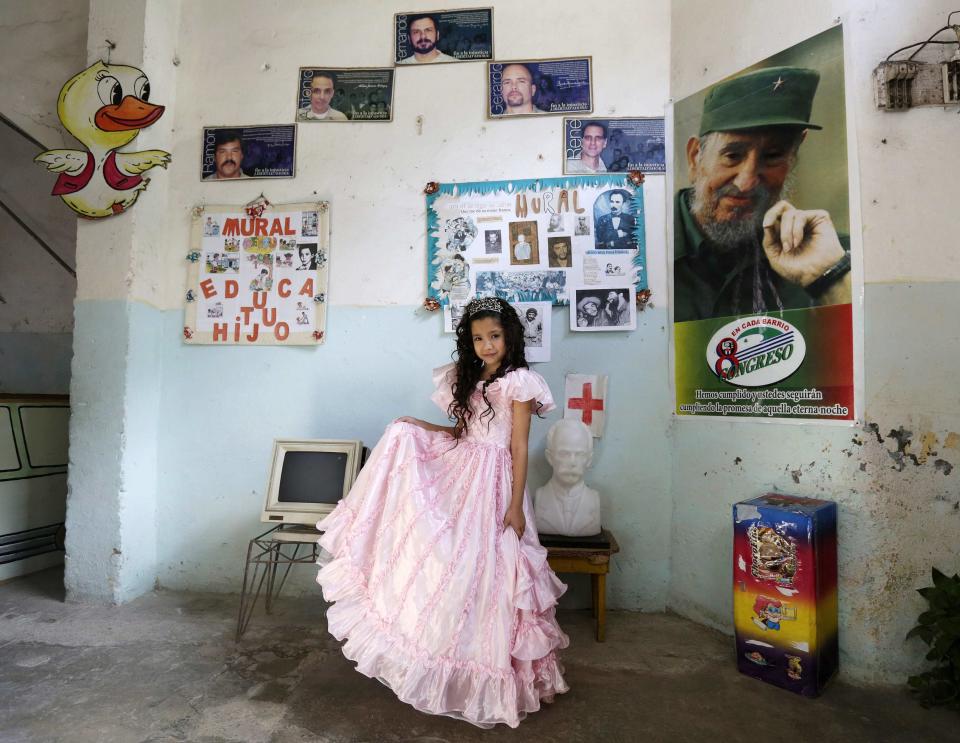 Fifth grade student at the Enrique Villuendas Primary School, Erika Kina, poses in her princess costume in Havana