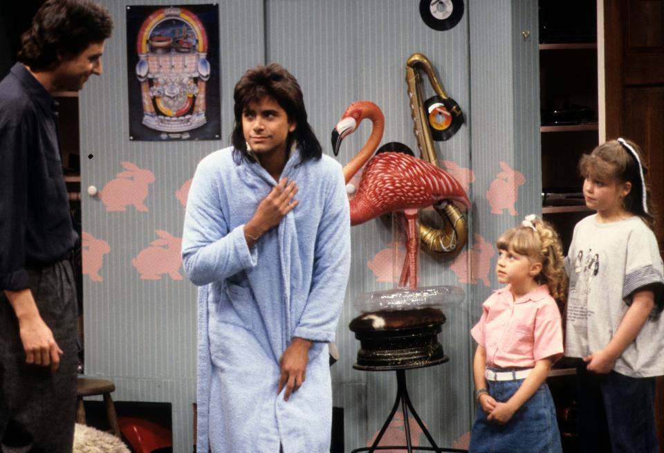 Uncle Jesse famously lived in a bedroom with pink bunnies on the wall in the show.