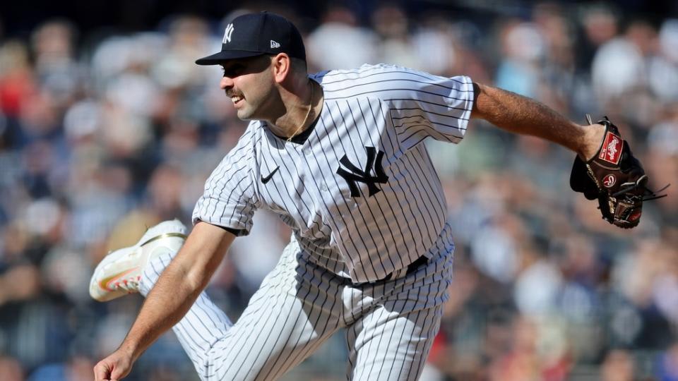 Oct 14, 2022;  Bronx, New York, USA;  New York Yankees relief pitcher Lou Trivino (56) pitches against the Cleveland Guardians during the sixth inning in game two of the ALDS for the 2022 MLB Playoffs at Yankee Stadium.