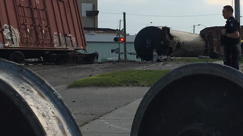 Propane tanker, box cars jump track in downtown Strathroy