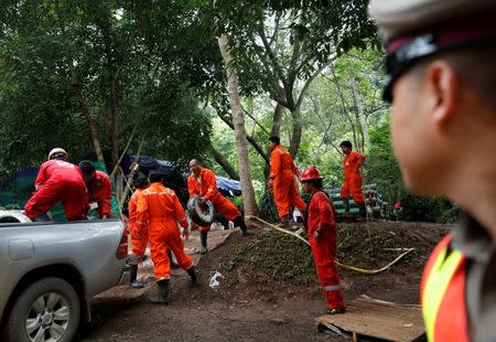 Rescue workers carry out operations near the Tham Luang cave complex, where 12 schoolboys and their soccer coach are trapped inside a flooded cave, in the northern province of Chiang Rai, Thailand, July 7, 2018. REUTERS/Soe Zeya Tun