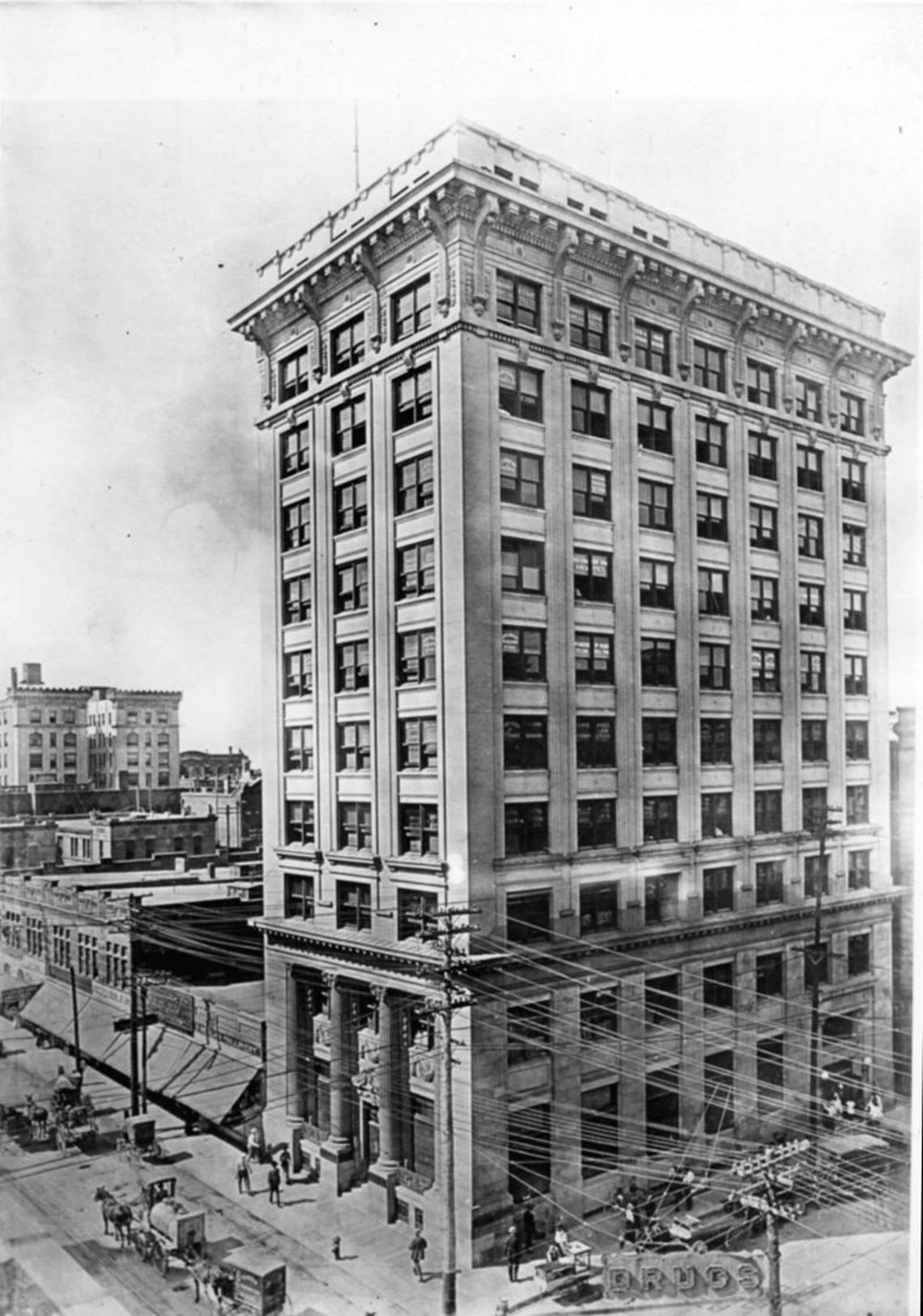 This 1911 photo shows the First National Bank building designed by architects Sanguinet and Staats in 1910 at the corner of Houston and Seventh streets downtown. In 1926 Wyatt C. Hedrick designed an addition built just to the north (left) which doubled the size of the building, adding three more bays to the Houston Street facade. The bank moved to a new site in 1961. In 1967, two years after it was sold to E.L. Baker Sr., a renovation added concrete panels to the street-level facade. XTO Energy bought the building in 2003.