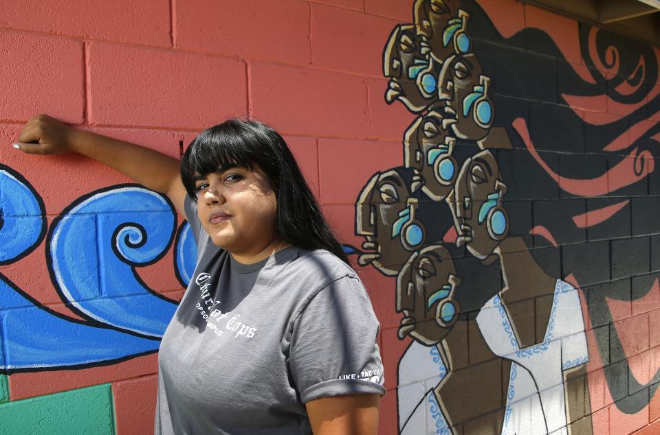 Michelle Ruiz, who started the student-led movement to get police out of schools in the Phoenix Union High School District, shown here at the Puente offices Thursday, June 18, 2020, in Phoenix. School districts around the country are voting to eliminate police from public schools. But this isn’t a sudden reaction to the killing of George Floyd in Minneapolis, but to a years-long movement led by students who say they feel unsafe with police on campus. (AP Photo/Ross D. Franklin)