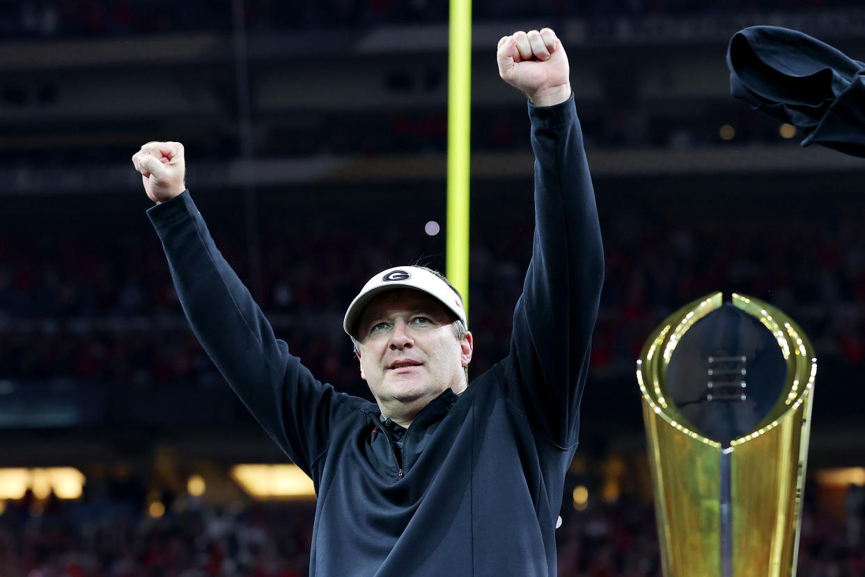 INDIANAPOLIS, INDIANA - JANUARY 10: Head coach Kirby Smart of the Georgia Bulldogs celebrates after the Georgia Bulldogs defeated the Alabama Crimson Tide 33-18 in the 2022 CFP National Championship Game at Lucas Oil Stadium on January 10, 2022 in Indianapolis, Indiana. (Photo by Kevin C. Cox/Getty Images)