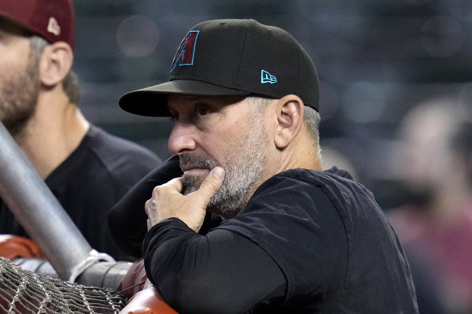 Arizona Diamondbacks manager Torey Lovullo watches batting practice Wednesday, Oct. 18, 2023, in Phoenix. The Diamondbacks will play Game 3 against the Philadelphia Phillies in the baseball NL Championship Series on Thursday. (AP Photo/Ross D. Franklin)