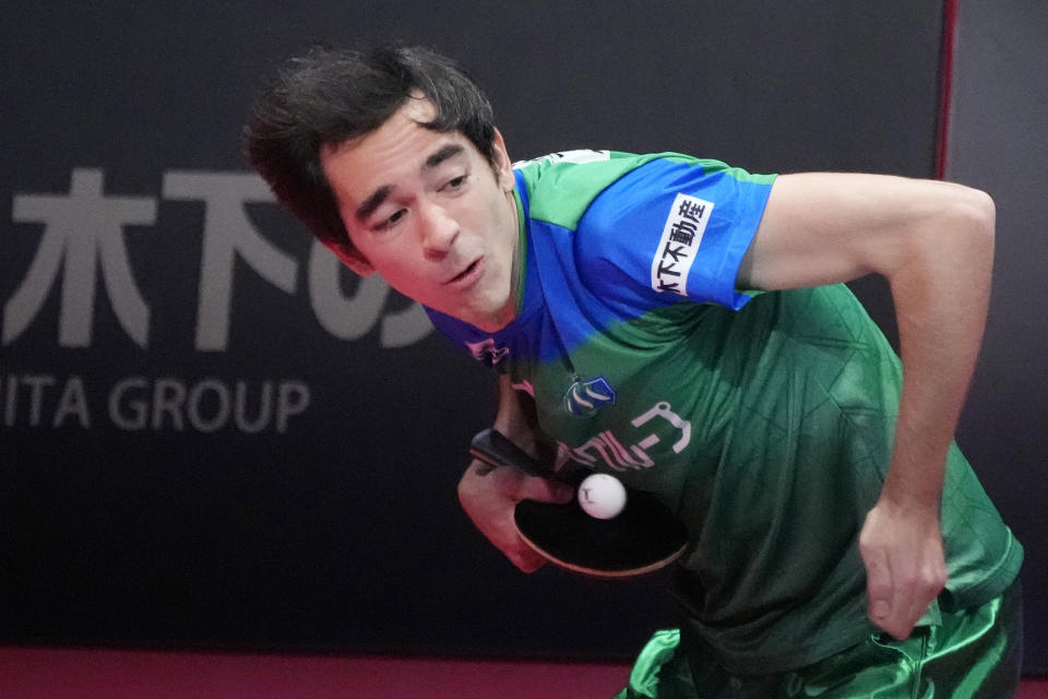 Brazil's Hugo Calderano tosses the ball to serve as he competes during a WTT tournament table tennis match, Sunday, Feb. 12, 2023, in Kawasaki, near Tokyo. Calderano is No. 5 in the sport’s ranking, he reached No. 3 a year ago, and he's defeated many of the top Chinese including No. 1 Fan Zhendong. (AP Photo/Eugene Hoshiko)