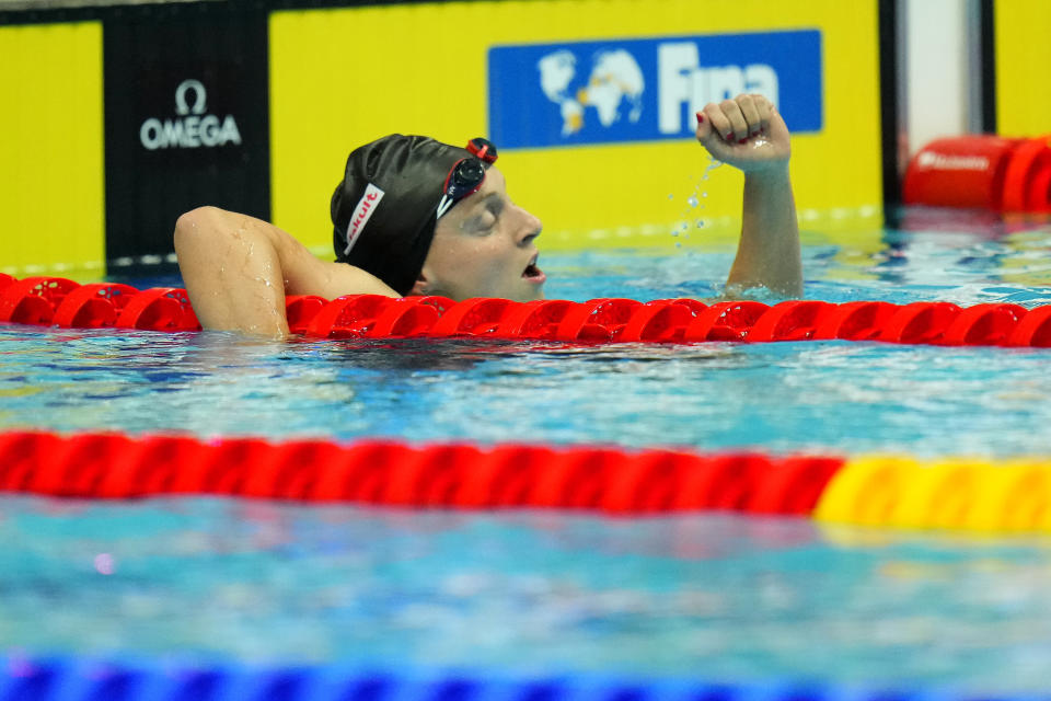 Katie Ledecky of United States celebrates after finishing first in the women's 400m freestyle final at the 19th FINA World Championships in Budapest, Hungary, Saturday, June 18, 2022. (AP Photo/Petr David Josek)