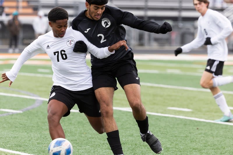 A Park City soccer player fights for possession against Murray Spartans Abdulmalik Shaher (2) during a game at Murray High School in Murray on Friday, April 5, 2024.