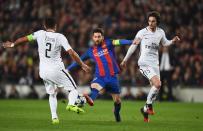 <p>Lionel Messi of Barcelona takes on Thiago Silva (2) and Adrien Rabiot of PSG (25) during the UEFA Champions League Round of 16 second leg match between FC Barcelona and Paris Saint-Germain at Camp Nou on March 8, 2017 in Barcelona, Spain. (Photo by Laurence Griffiths/Getty Images) </p>