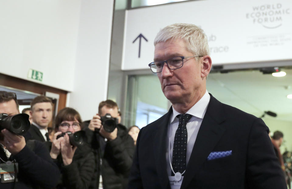 Apple's CEO Tim Cook is photographed at the World Economic Forum in Davos, Switzerland, Tuesday, Jan. 21, 2020. The 50th annual meeting of the forum will take place in Davos from Jan. 21 until Jan. 24, 2020. (AP Photo/Markus Schreiber)