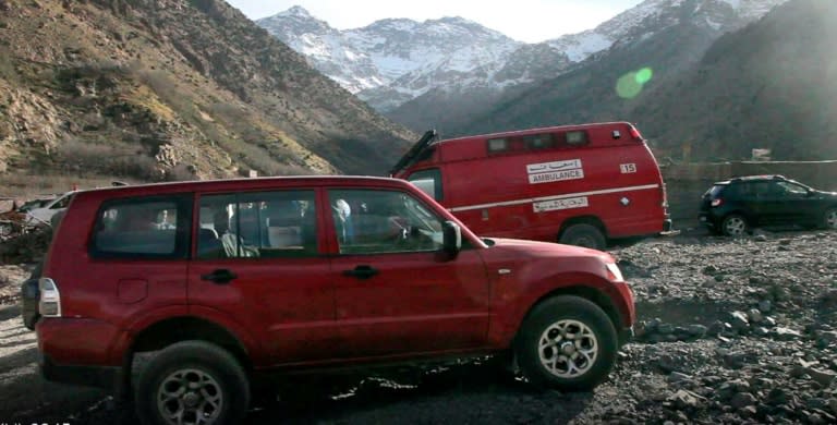 An image grab from a video broadcast by Moroccan news channel KECH24 on December 18, 2018 shows cars and an ambulance at the site where the bodies of two murdered Scandinavian women were found in the High Atlas mountains