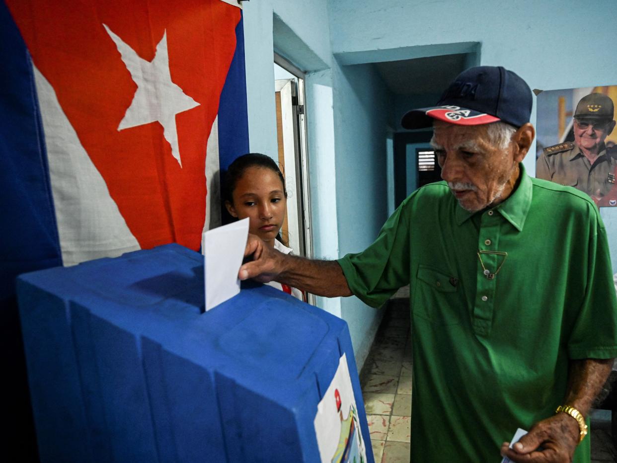 A man casts his ballot at a polling station during the new Family Code referendum in Havana, on September 25, 2022.