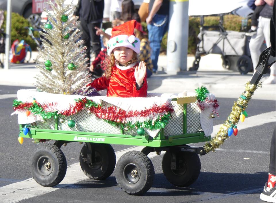 The 75th Annual Victorville Christmas Parade on Saturday included marching bands, vintage cars, dancers, horses, cheer squads, Victorville City Council members and more.