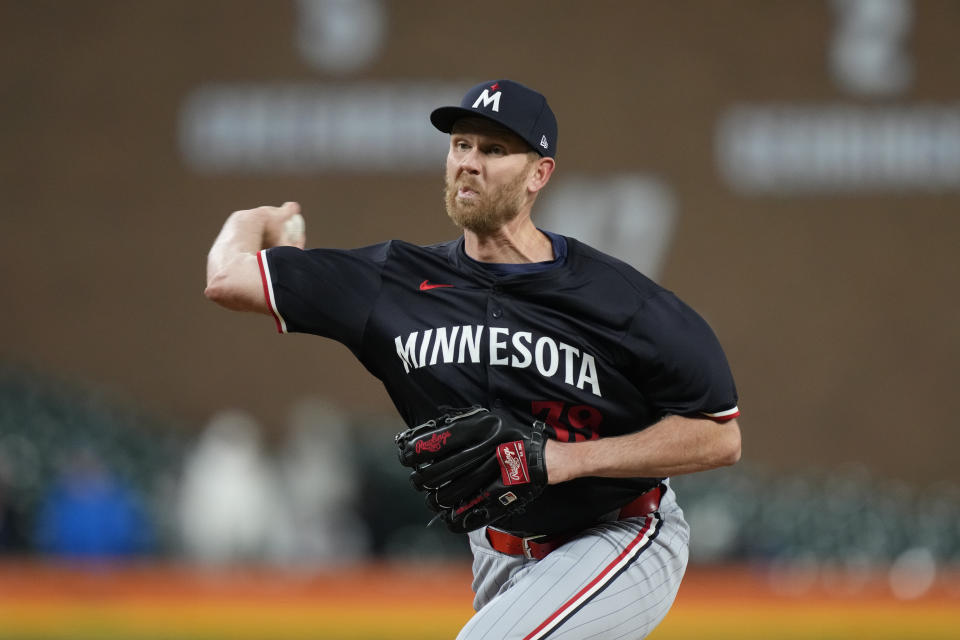 Minnesota Twins pitcher Michael Tonkin throws during the seventh inning of a baseball game against the Detroit Tigers, Friday, April 12, 2024, in Detroit. (AP Photo/Carlos Osorio)