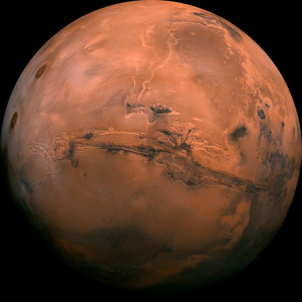 This image made available by NASA shows the planet Mars. This composite photo was created from over 100 images of Mars taken by Viking Orbiters in the 1970s. In our solar system family, Mars is Earth’s next-of-kin, the next-door relative that has captivated humans for millennia.
