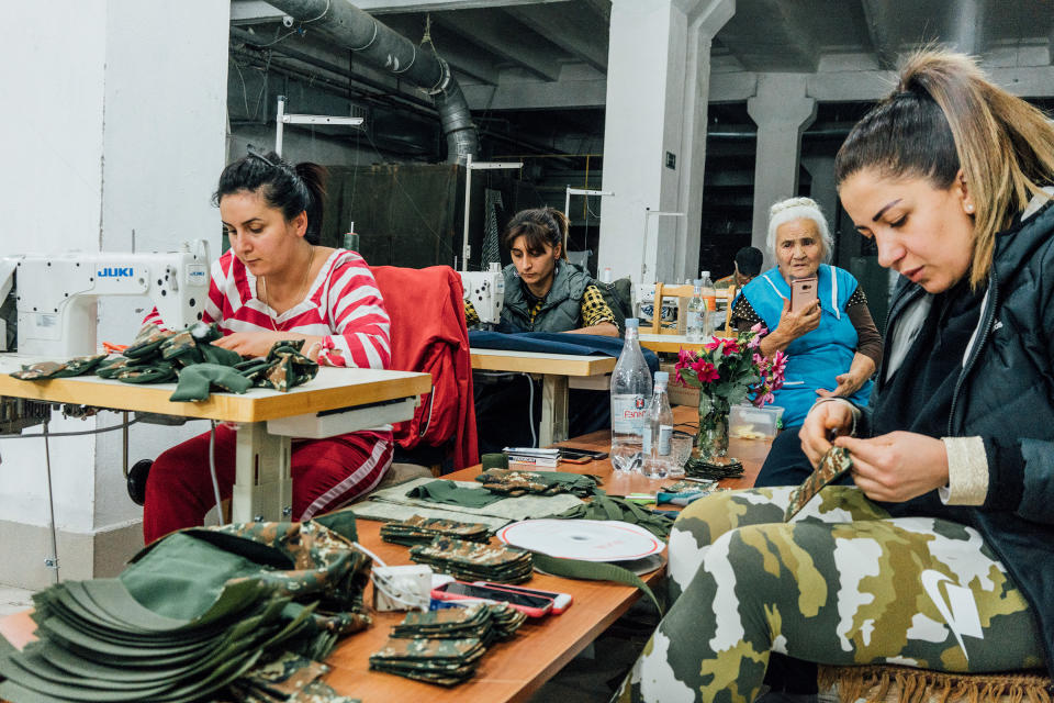 Armenian volunteers in Stepanakert sew uniforms and sleeping bags for soldiers on the frontline.<span class="copyright">Emanuele Satolli</span>