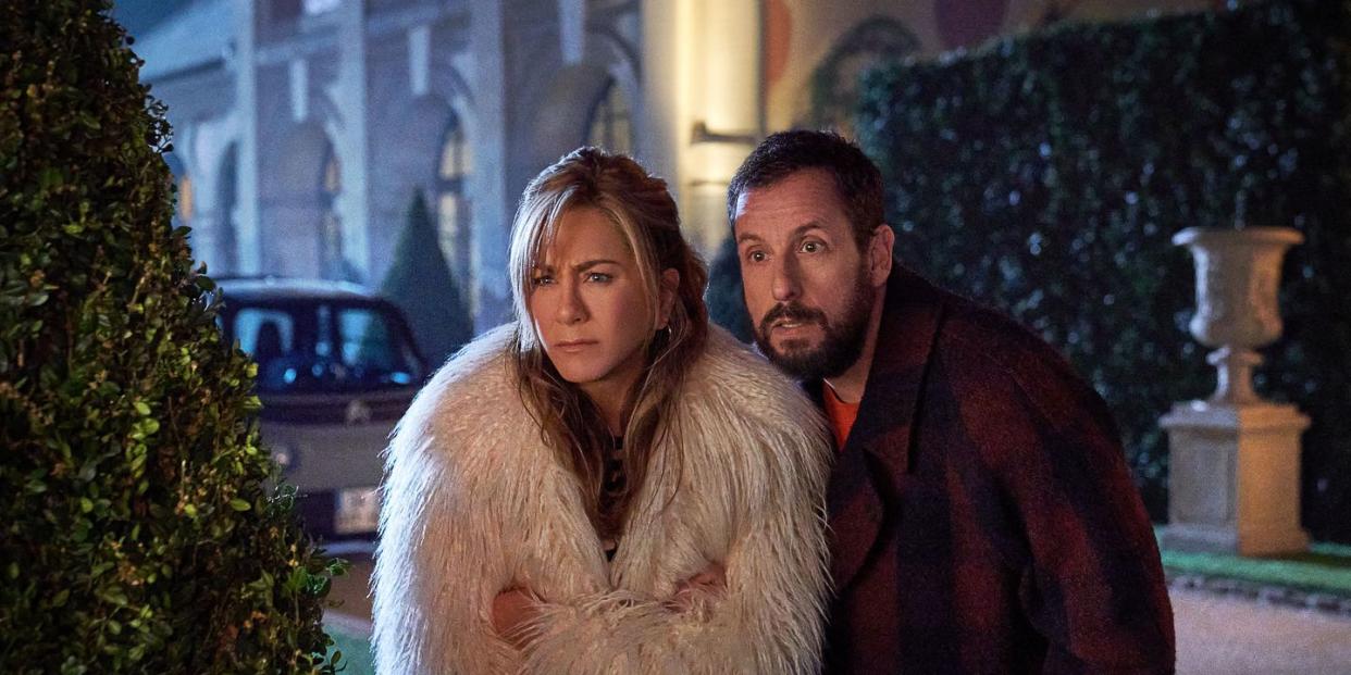 murder mystery 2 jennifer aniston adam sandler, outdoor in winter coats looking confused