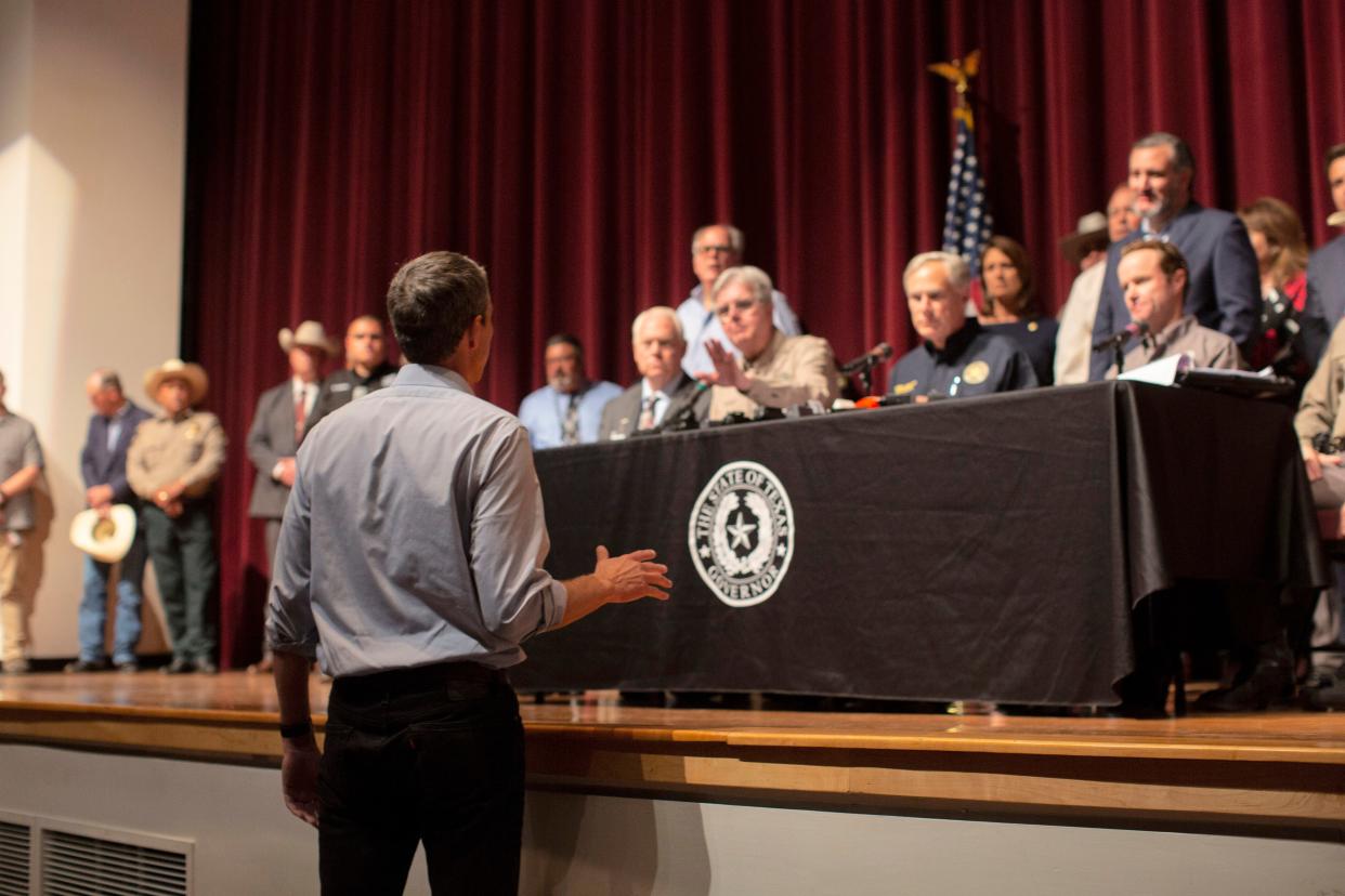 Democrat Beto O’Rourke, who is running against Abbott for governor this year, interrupts a news conference headed by Texas Gov. Greg Abbott in Uvalde, Texas Wednesday, May 25, 2022. 