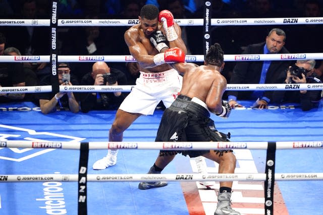 Jermaine Franklin, front, lands a punch on Anthony Joshua