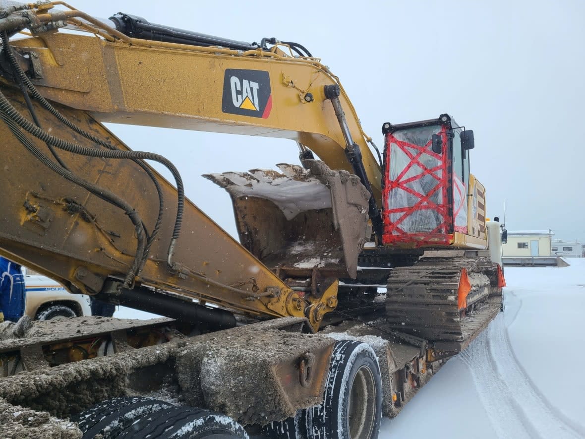 The RCMP says it's investigating damages to three pieces of heavy equipment at a World Energy GH2 job site in Mainland, on Newfoundland Port au Port Peninsula. (RCMP - image credit)