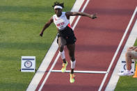 Will Claye competes during the finals of men's triple jump at the U.S. Olympic Track and Field Trials Monday, June 21, 2021, in Eugene, Ore. (AP Photo/Charlie Riedel)