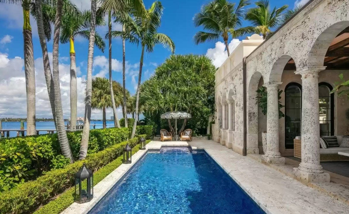 A lakeside lap pool and arcaded loggia are among the amenities of the house Tommy and Dee Hilfiger just listed for sale at $35.9 million in Palm Beach.