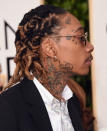 <p>From magenta locks to a mop top, Wiz Khalifa has been known to experiment with his hair. Tonight, the rapper opted for dual-toned locks braided into thick cornrows. <i>(Photo: Getty Images)</i></p>