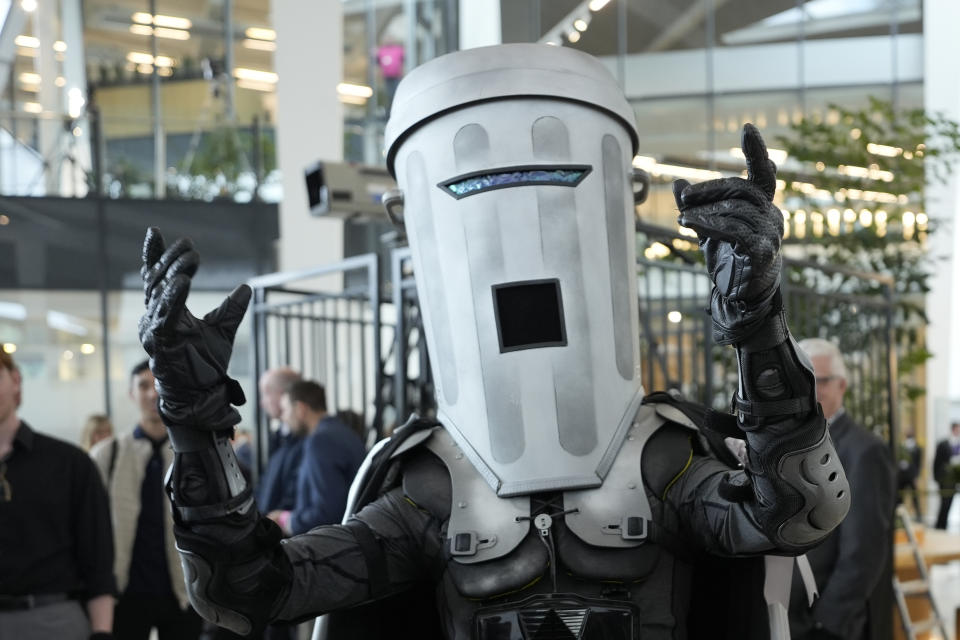 Count Binface, a candidate in the London Mayoral election poses for the cameras at the count result in City Hall in London, Saturday, May 4, 2024. (AP Photo/Alastair Grant)