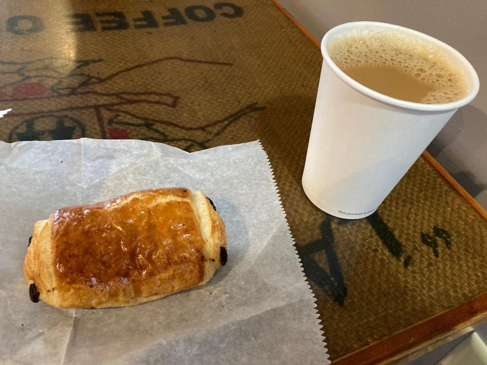 A chocolate croissant and coffee at the Capitol Grounds Cafe in Montpelier on Dec. 15, 2023.