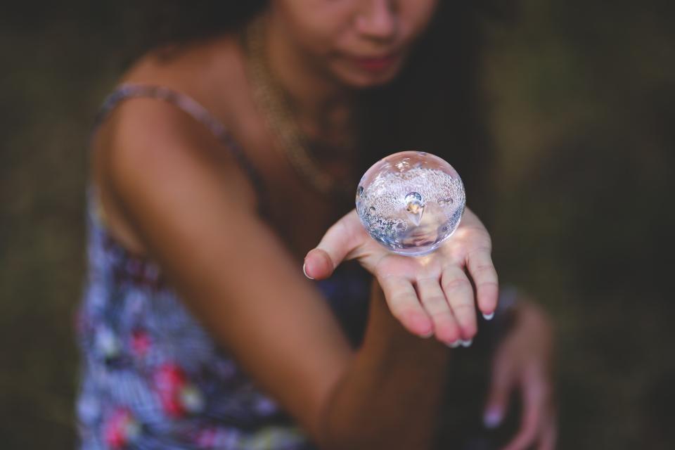 Crystal ball with hand