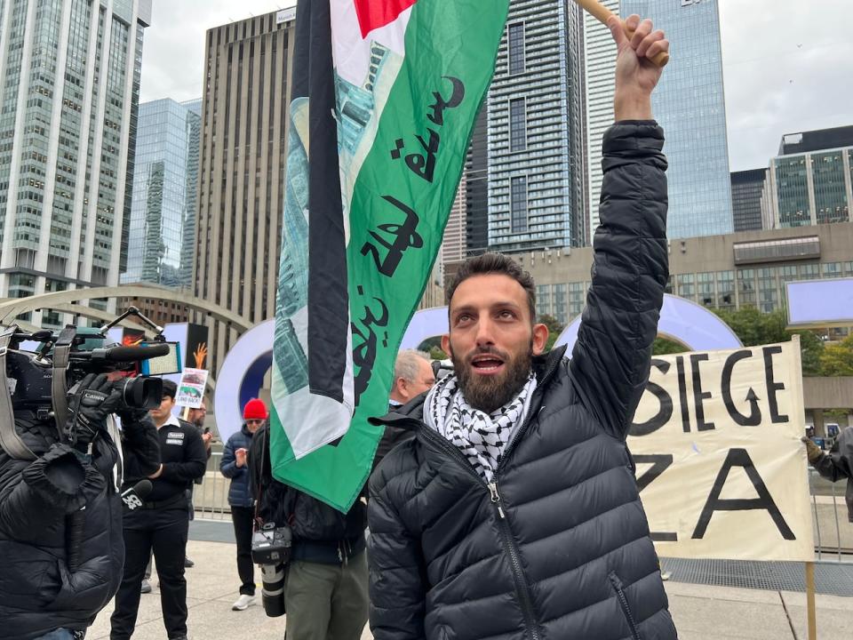 The rally in Toronto was a peaceful affair. Supporters held Palestinian flags chanting 'free Palestine' as they marched along Queen Street