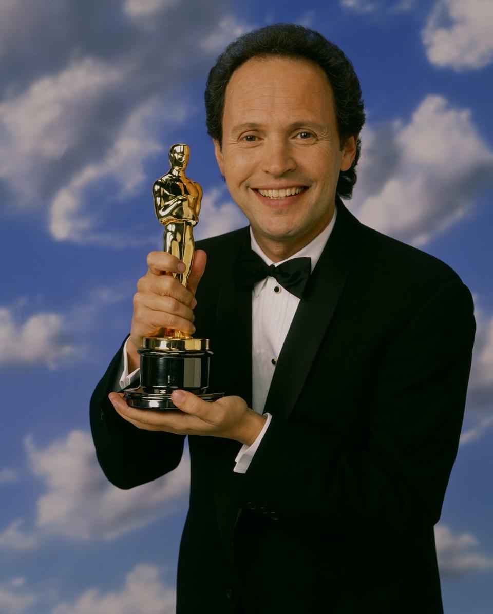 <p>Billy Crystal's big '90s roles included <em>City Slickers, Deconstructing Harry</em>, and <em>Analyze This</em>. He also hosted the Academy Awards several times throughout the decade.</p>